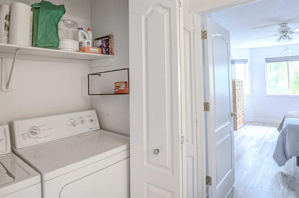58 Sierra Morena Gardens Sw, Calgary, AB - Indoor Photo Showing Laundry Room
