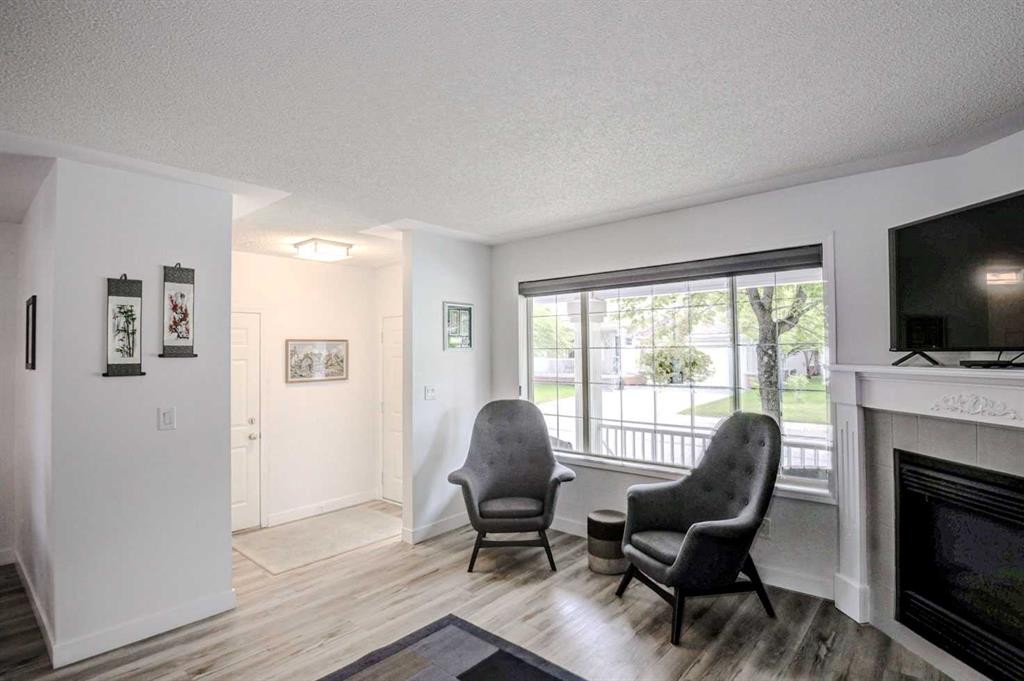 58 Sierra Morena Gardens Sw, Calgary, AB - Indoor Photo Showing Living Room With Fireplace