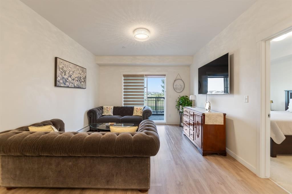 3108-99 Copperstone Park Se, Calgary, AB - Indoor Photo Showing Living Room
