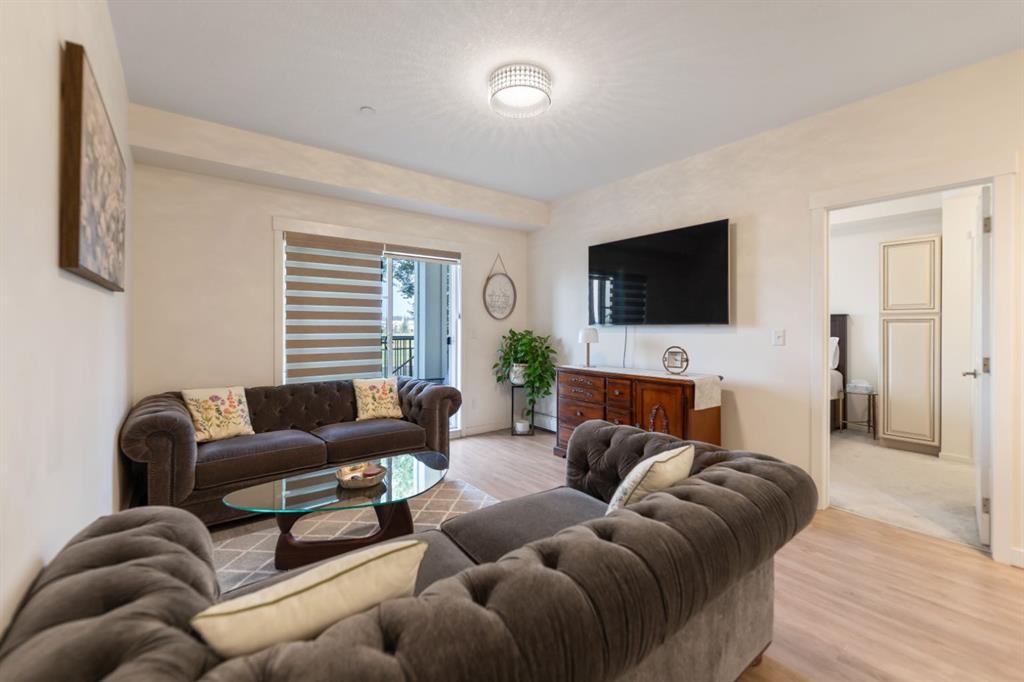 3108-99 Copperstone Park Se, Calgary, AB - Indoor Photo Showing Living Room