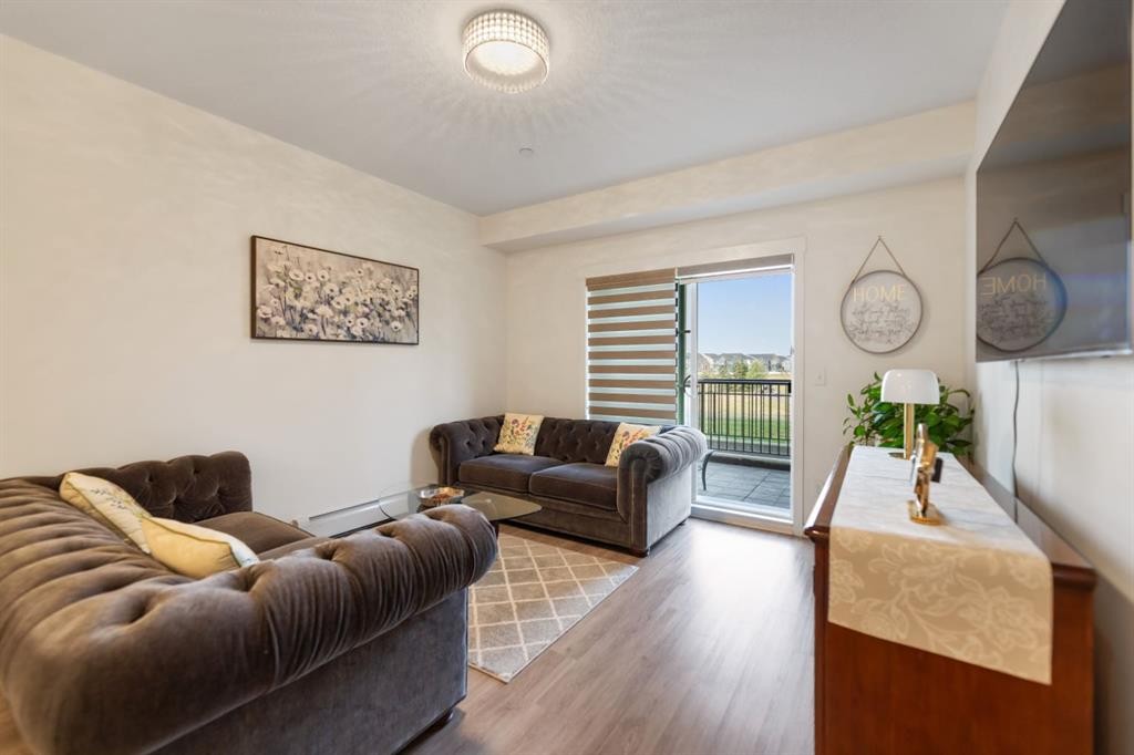 3108-99 Copperstone Park Se, Calgary, AB - Indoor Photo Showing Living Room