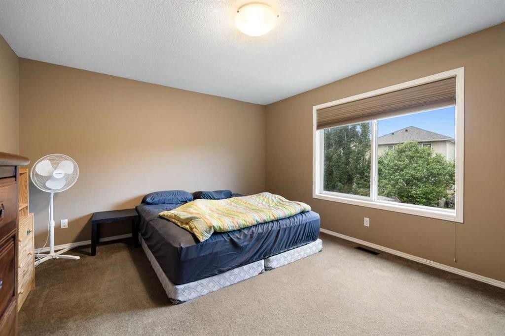 19 Silverado Skies Bay Sw, Calgary, AB - Indoor Photo Showing Bedroom