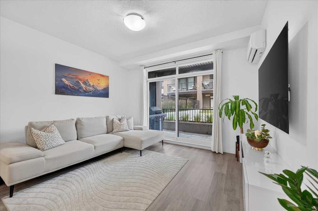 4101-200 Seton Circle Se, Calgary, AB - Indoor Photo Showing Living Room