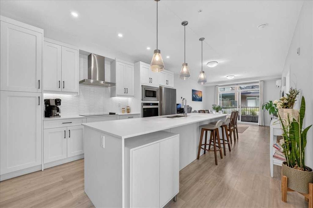 4101-200 Seton Circle Se, Calgary, AB - Indoor Photo Showing Kitchen With Upgraded Kitchen