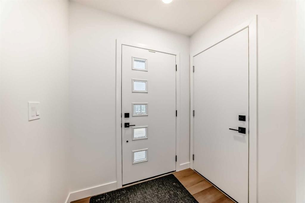 103 Osprey Hill Point Sw, Calgary, AB - Indoor Photo Showing Other Room