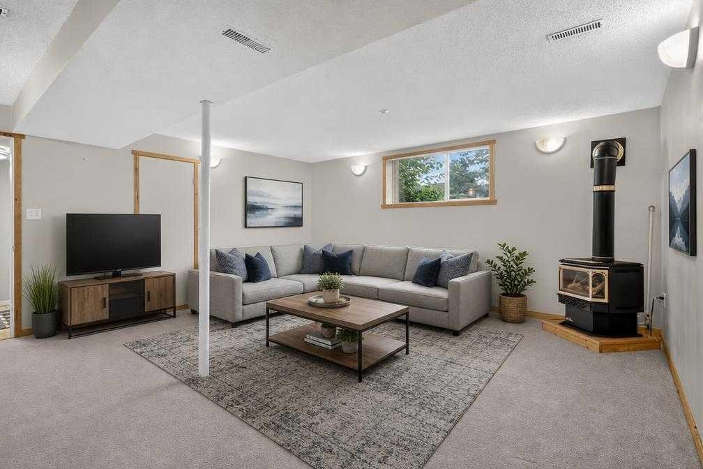 152 Maddock Way Ne, Calgary, AB - Indoor Photo Showing Living Room
