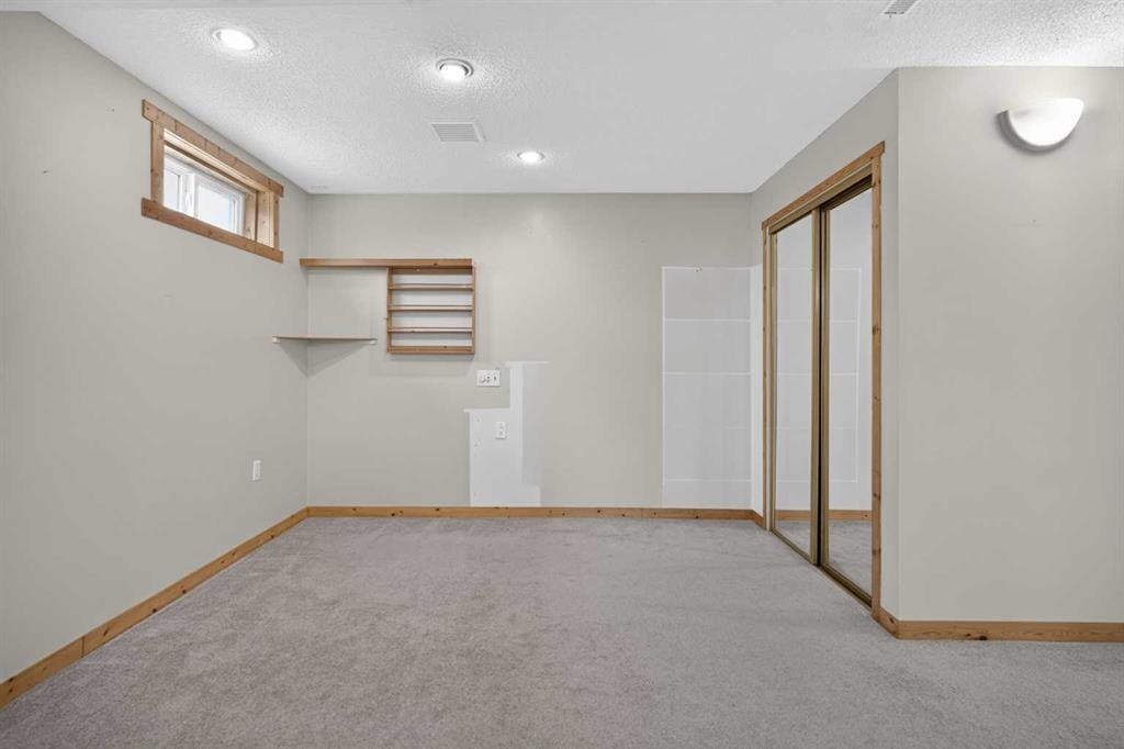 152 Maddock Way Ne, Calgary, AB - Indoor Photo Showing Other Room