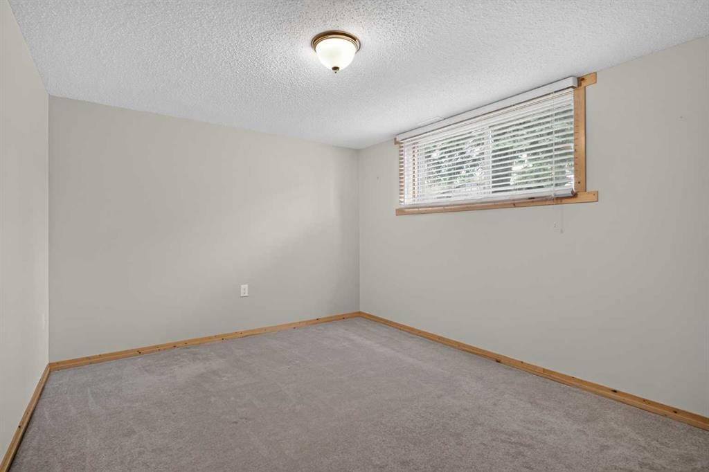 152 Maddock Way Ne, Calgary, AB - Indoor Photo Showing Other Room