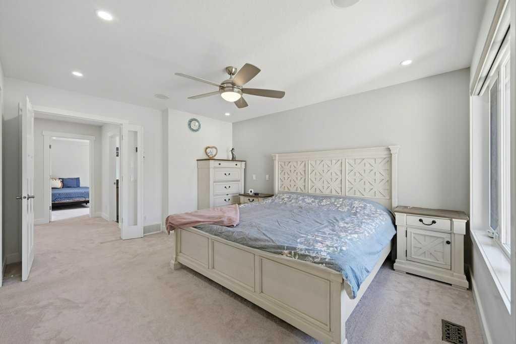 160 Panatella Crescent Nw, Calgary, AB - Indoor Photo Showing Bedroom