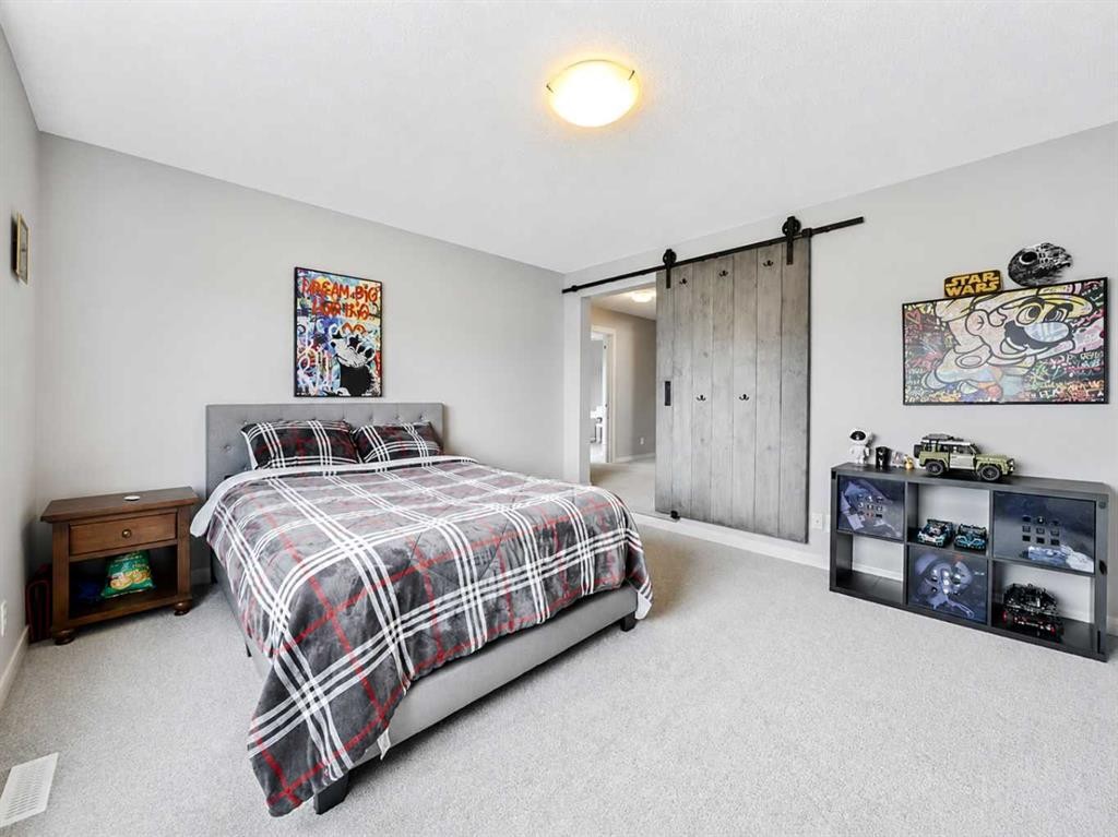 109 Seagreen Link, Chestermere, AB - Indoor Photo Showing Bedroom