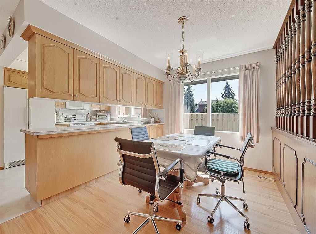 9556 Oakland Way Sw, Calgary, AB - Indoor With Fireplace