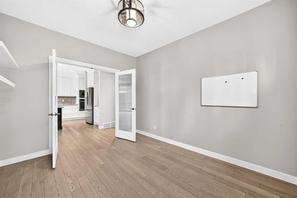 143 Stonemere Green, Chestermere, AB - Indoor Photo Showing Other Room