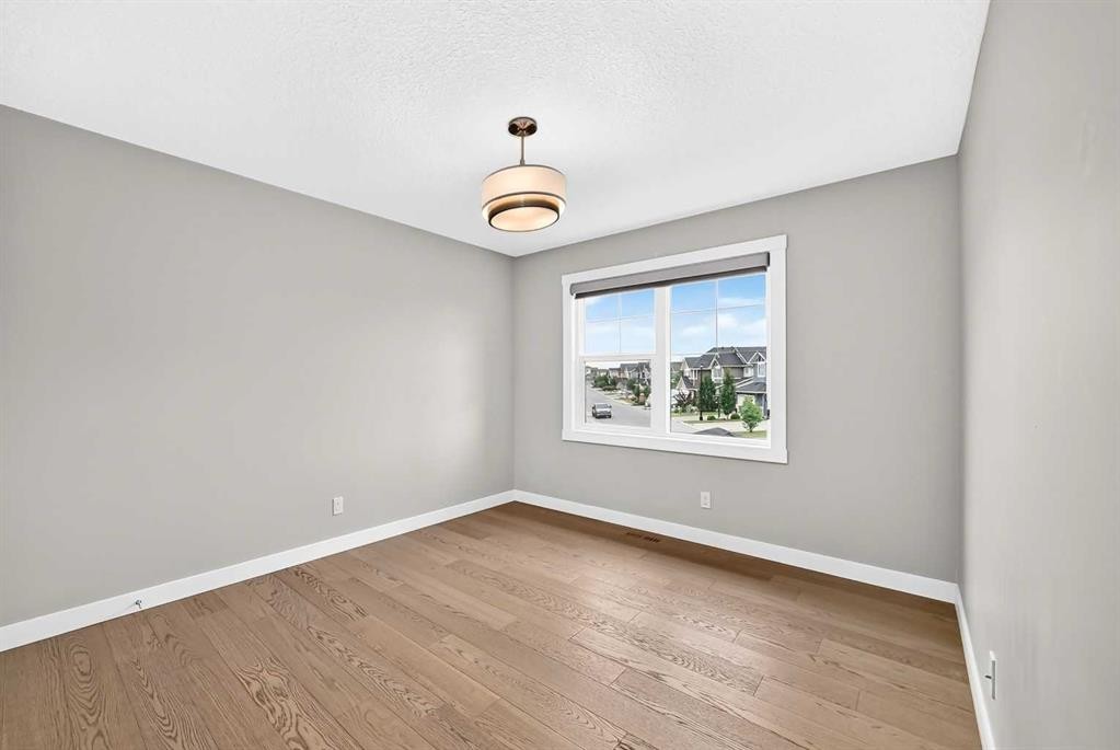 143 Stonemere Green, Chestermere, AB - Indoor Photo Showing Other Room