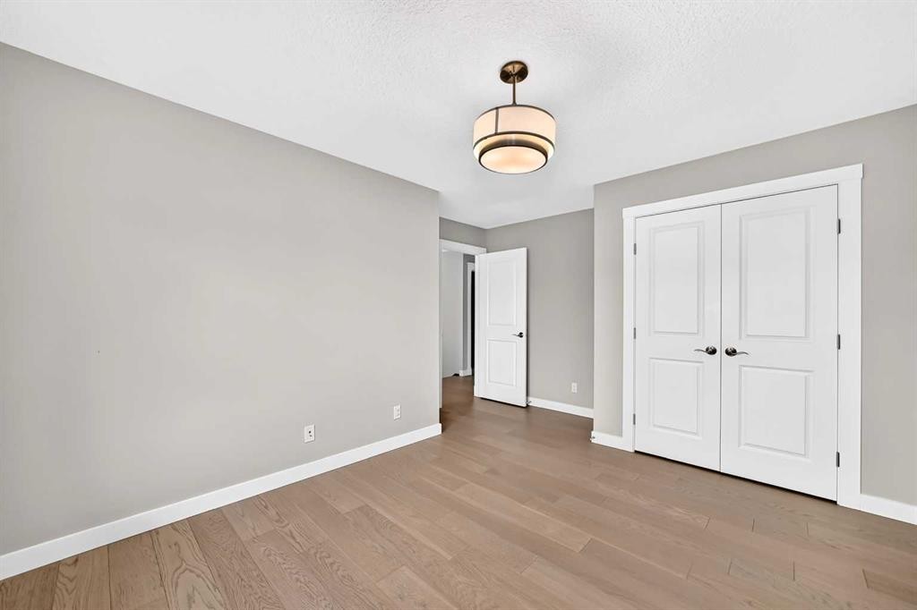 143 Stonemere Green, Chestermere, AB - Indoor Photo Showing Other Room