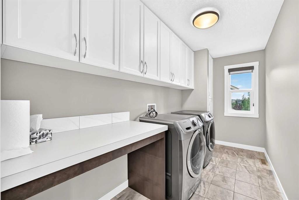 143 Stonemere Green, Chestermere, AB - Indoor Photo Showing Laundry Room