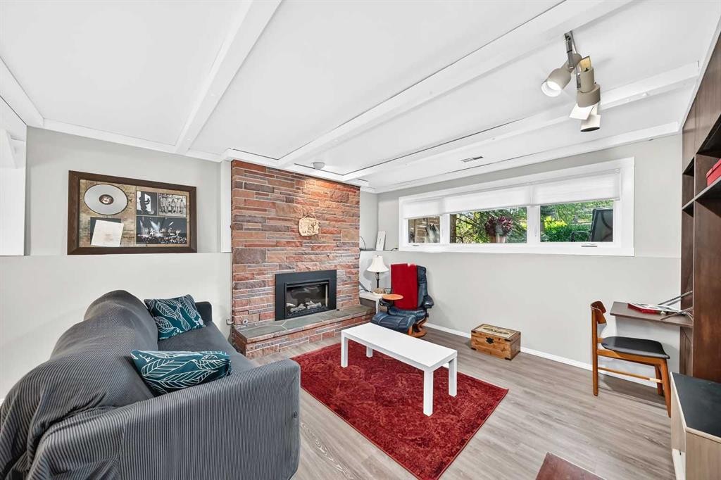 9120 48 Avenue Nw, Calgary, AB - Indoor Photo Showing Living Room With Fireplace