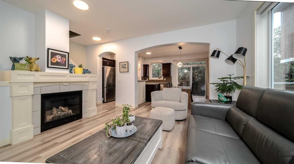 93 Cranleigh Heath Se, Calgary, AB - Indoor Photo Showing Living Room With Fireplace