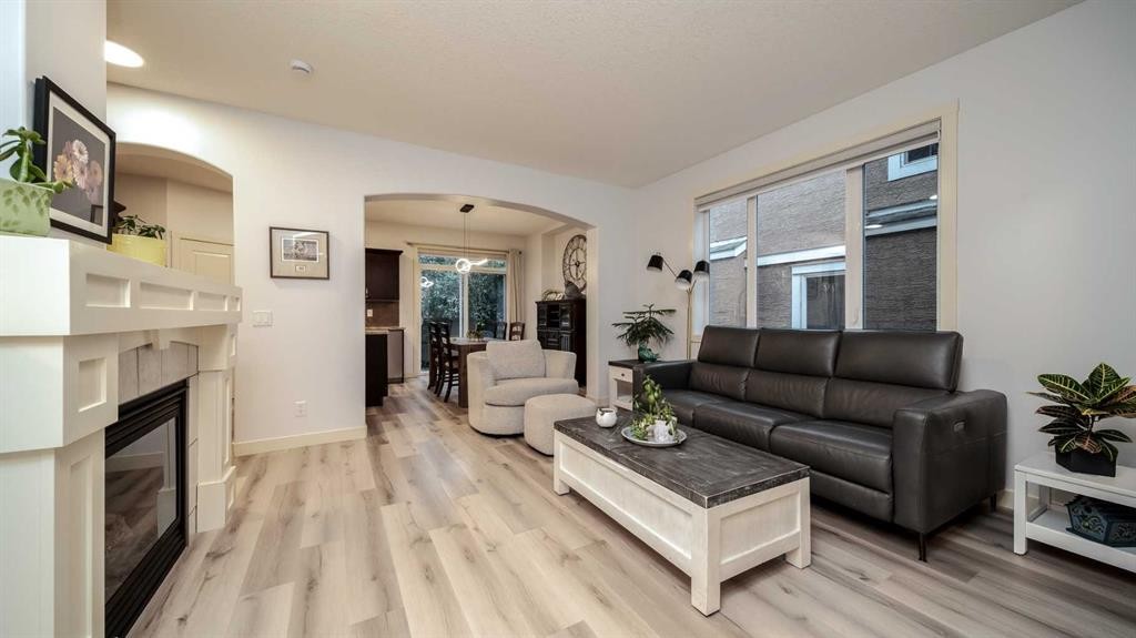 93 Cranleigh Heath Se, Calgary, AB - Indoor Photo Showing Living Room With Fireplace
