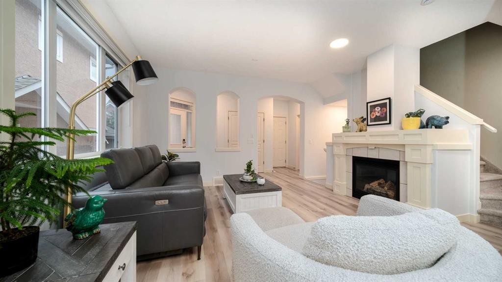 93 Cranleigh Heath Se, Calgary, AB - Indoor Photo Showing Living Room With Fireplace
