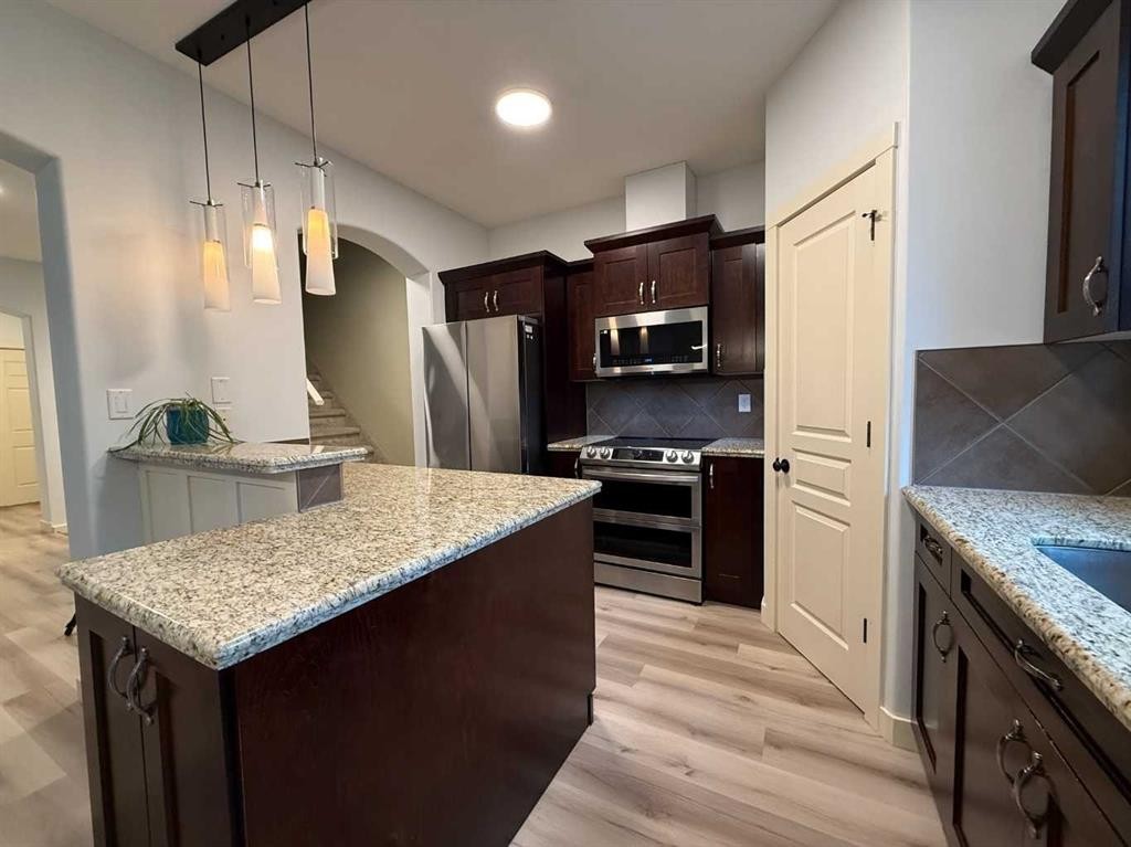93 Cranleigh Heath Se, Calgary, AB - Indoor Photo Showing Kitchen With Stainless Steel Kitchen