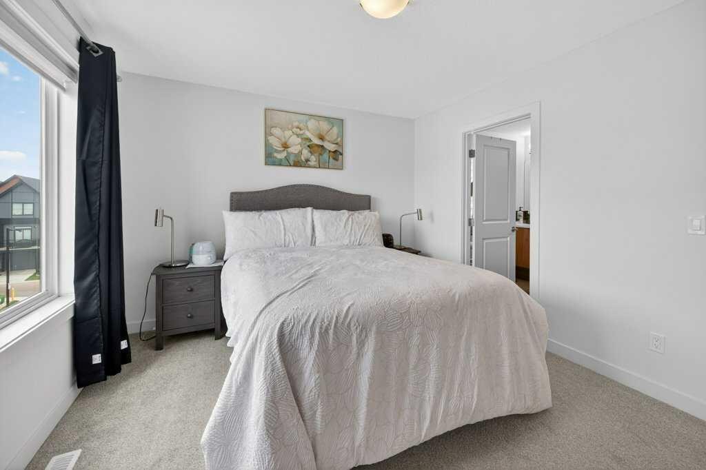 606-550 Seton Circle Se, Calgary, AB - Indoor Photo Showing Bedroom