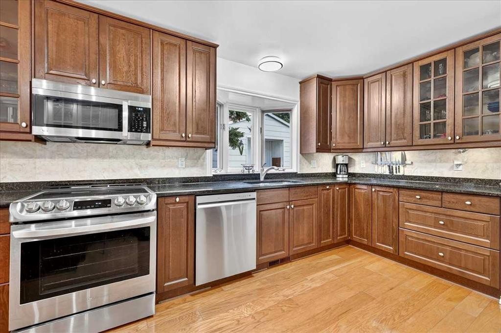 1707 107 Avenue Sw, Calgary, AB - Indoor Photo Showing Kitchen With Stainless Steel Kitchen
