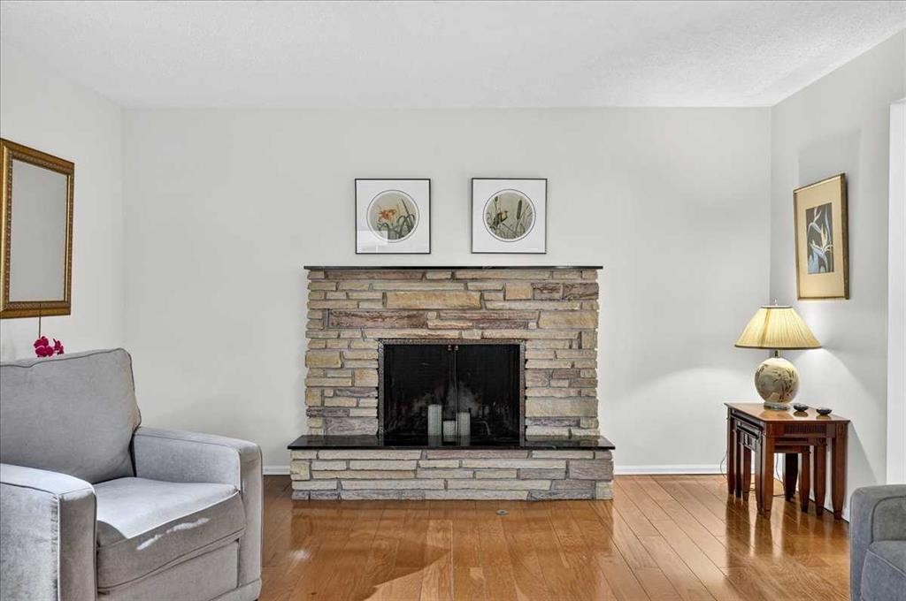 1707 107 Avenue Sw, Calgary, AB - Indoor Photo Showing Living Room With Fireplace