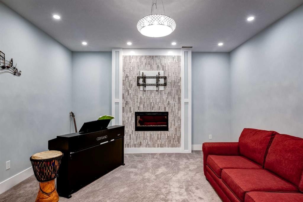 40 Westmore Place Sw, Calgary, AB - Indoor With Fireplace