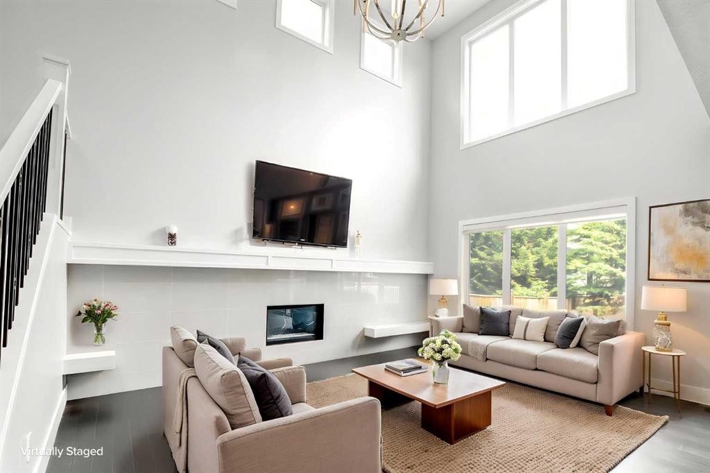 40 Westmore Place Sw, Calgary, AB - Indoor Photo Showing Living Room With Fireplace