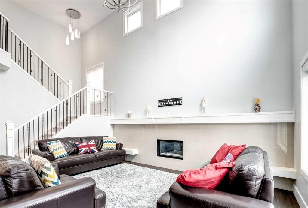 40 Westmore Place Sw, Calgary, AB - Indoor With Fireplace