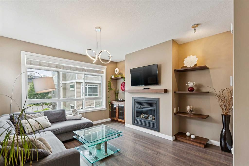 26 Skyview Ranch Gardens Ne, Calgary, AB - Indoor Photo Showing Living Room With Fireplace