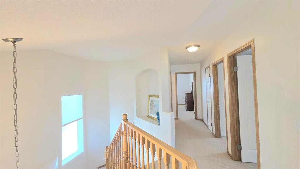 210 Panamount Hill Nw, Calgary, AB - Indoor Photo Showing Other Room