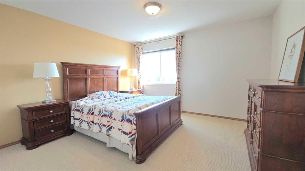 210 Panamount Hill Nw, Calgary, AB - Indoor Photo Showing Bedroom
