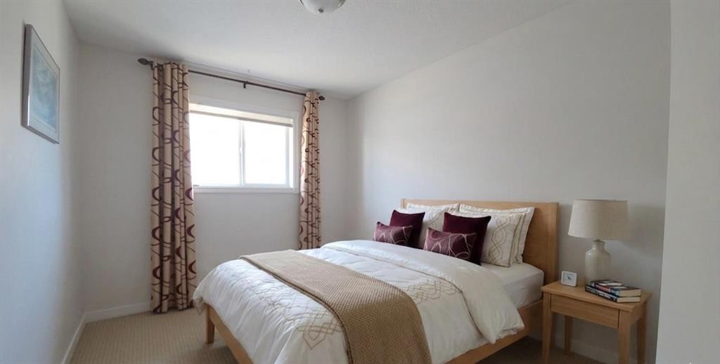210 Panamount Hill Nw, Calgary, AB - Indoor Photo Showing Bedroom