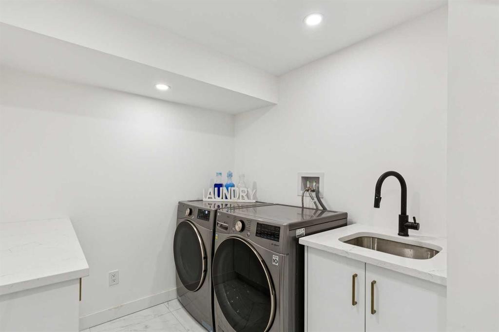 14 Butte Place Nw, Calgary, AB - Indoor Photo Showing Laundry Room