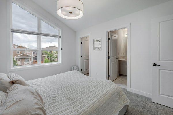 174 Rowley Gate Nw, Calgary, AB - Indoor Photo Showing Bedroom