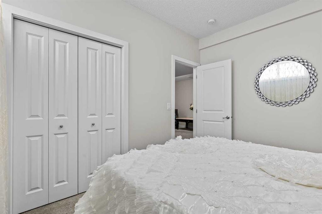 119 Walgrove Green Se, Calgary, AB - Indoor Photo Showing Bedroom
