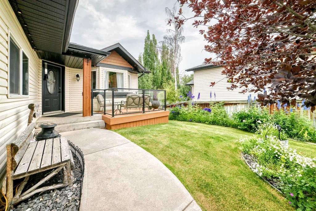 61 West Edge Road, Cochrane, AB - Outdoor With Deck Patio Veranda