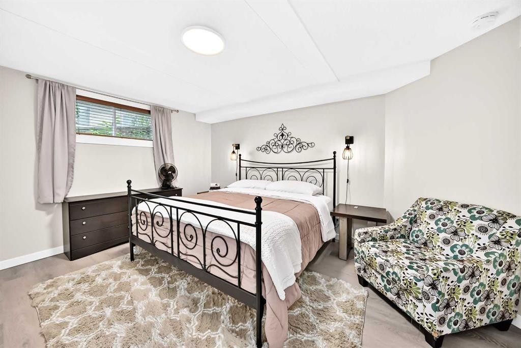 61 West Edge Road, Cochrane, AB - Indoor Photo Showing Bedroom
