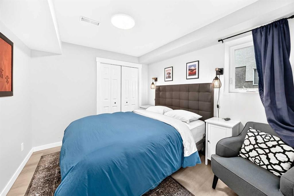 61 West Edge Road, Cochrane, AB - Indoor Photo Showing Bedroom