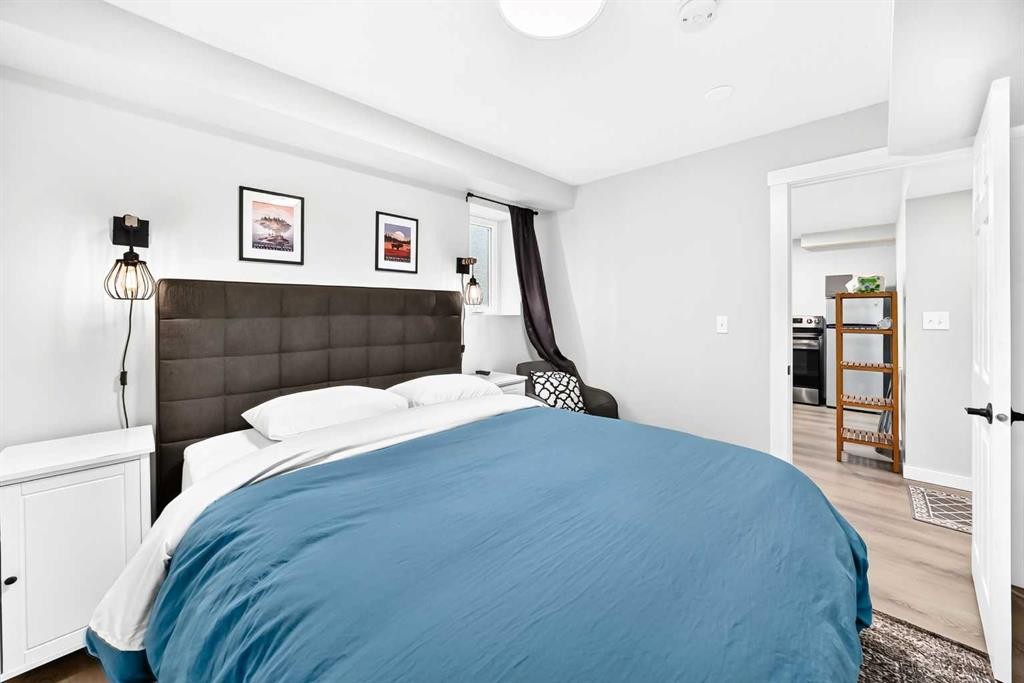 61 West Edge Road, Cochrane, AB - Indoor Photo Showing Bedroom