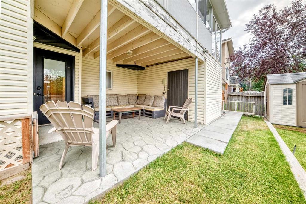 61 West Edge Road, Cochrane, AB - Outdoor With Deck Patio Veranda With Exterior