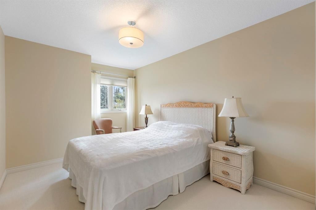 311 Woodhaven Bay Sw, Calgary, AB - Indoor Photo Showing Bedroom