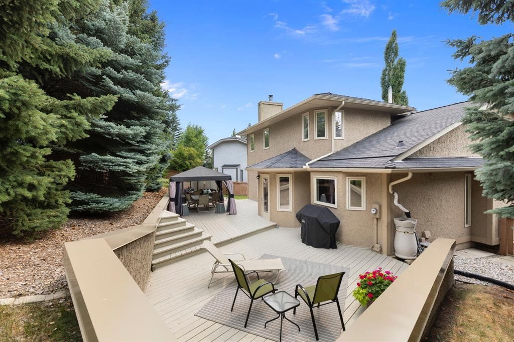 311 Woodhaven Bay Sw, Calgary, AB - Outdoor With Deck Patio Veranda
