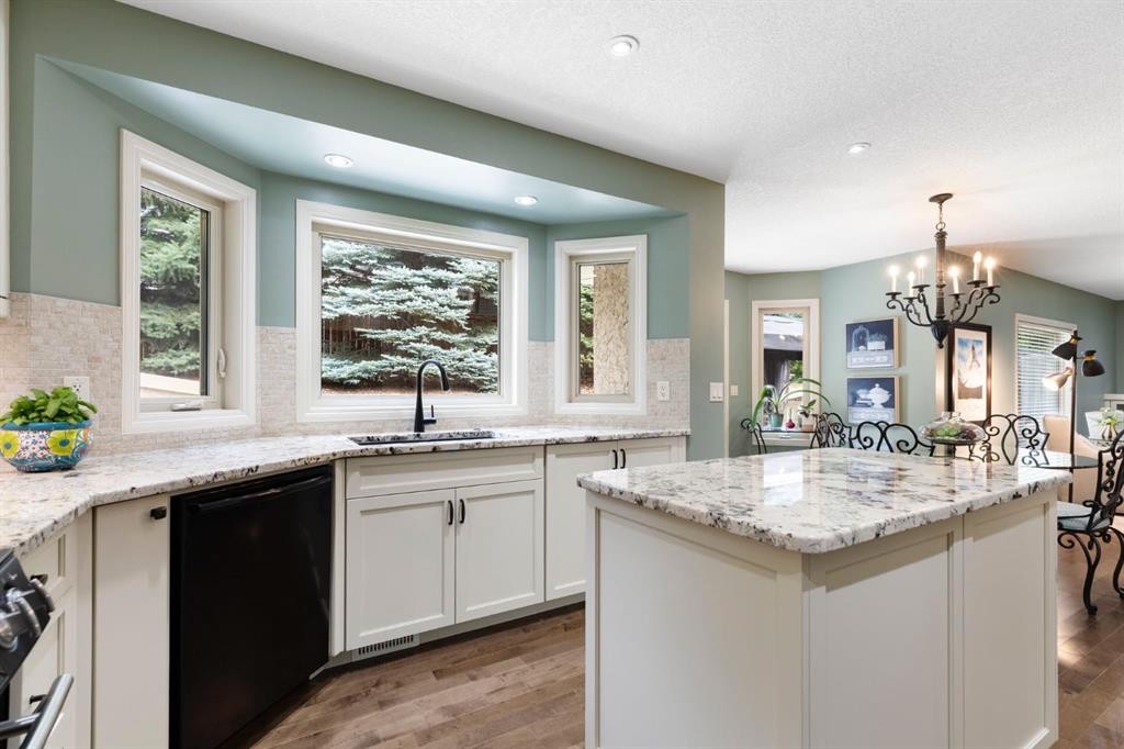 311 Woodhaven Bay Sw, Calgary, AB - Indoor Photo Showing Kitchen With Upgraded Kitchen