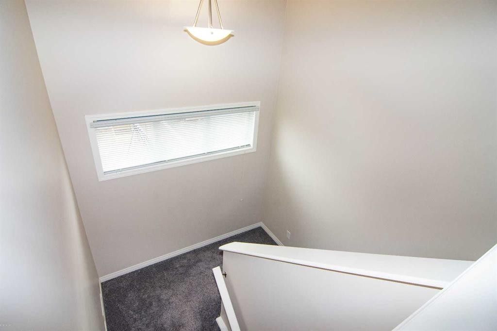 754 Luxstone Gate Sw, Airdrie, AB - Indoor Photo Showing Other Room