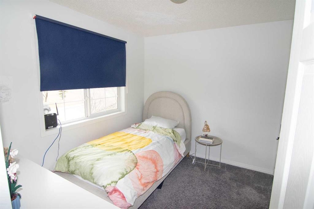 754 Luxstone Gate Sw, Airdrie, AB - Indoor Photo Showing Bedroom