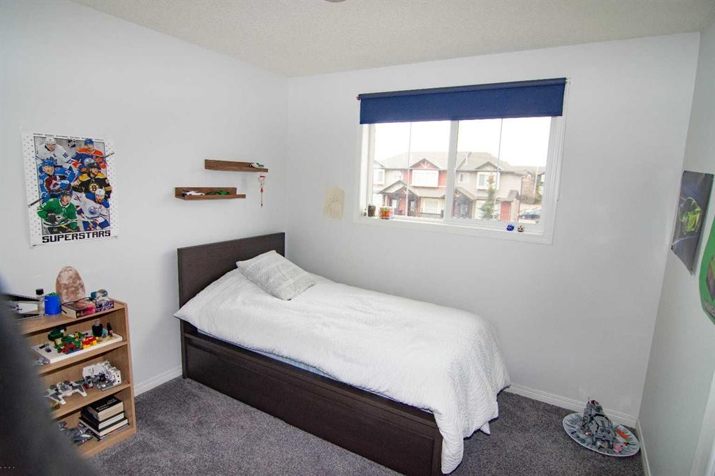 754 Luxstone Gate Sw, Airdrie, AB - Indoor Photo Showing Bedroom