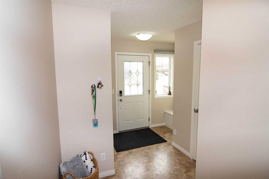 754 Luxstone Gate Sw, Airdrie, AB - Indoor Photo Showing Other Room