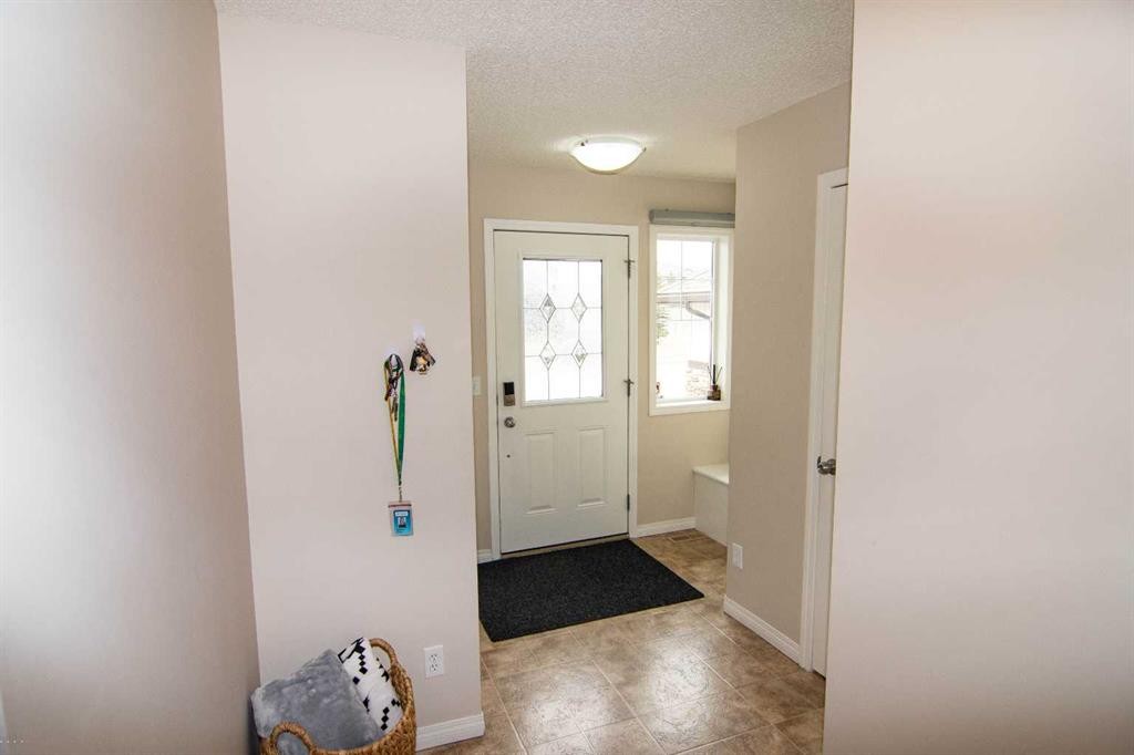 754 Luxstone Gate Sw, Airdrie, AB - Indoor Photo Showing Other Room
